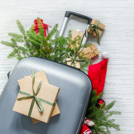 Suitcase with presents on top