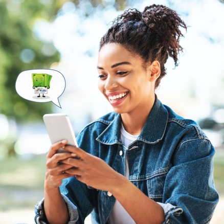 woman looking at phone with chat bubble