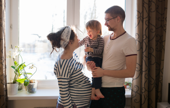 pregnant woman, man, and baby