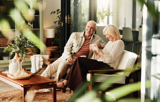 older couple sitting in room 